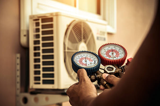 Professional Air Conditioning Service technician working in Woodmere, NY
